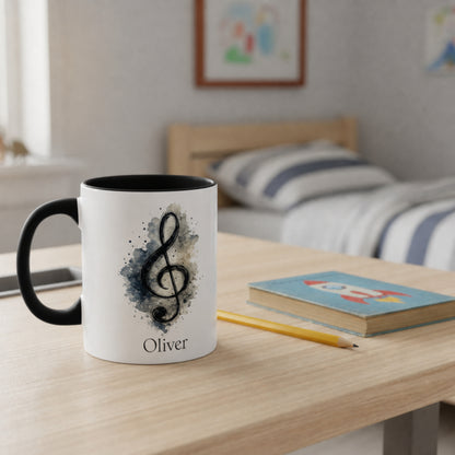 Personalised Treble Adventures piano mug with black handle displayed on a desk beside books in a bedroom