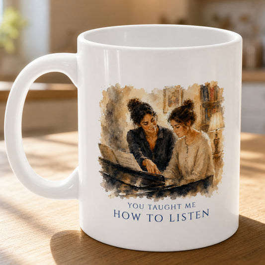 Close-up of the You Taught Me How To Listen piano teacher appreciation mug featuring warm painterly artwork of a piano teacher guiding a student during a lesson.