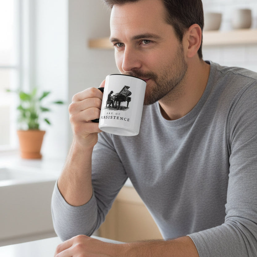 Person enjoying coffee from The Aspiring Pianist piano mug.