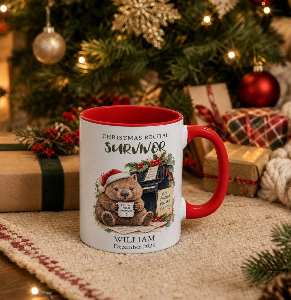 Personalised wombat piano mug displayed with Christmas gifts and decorations, designed as a Christmas recital keepsake for piano students.