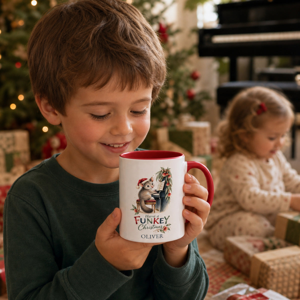 Child holding a personalised possum piano Christmas mug with red handle