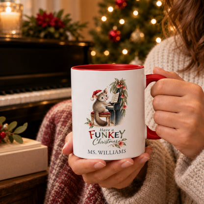 Personalised possum Christmas mug held beside a piano in a festive Australian Christmas setting