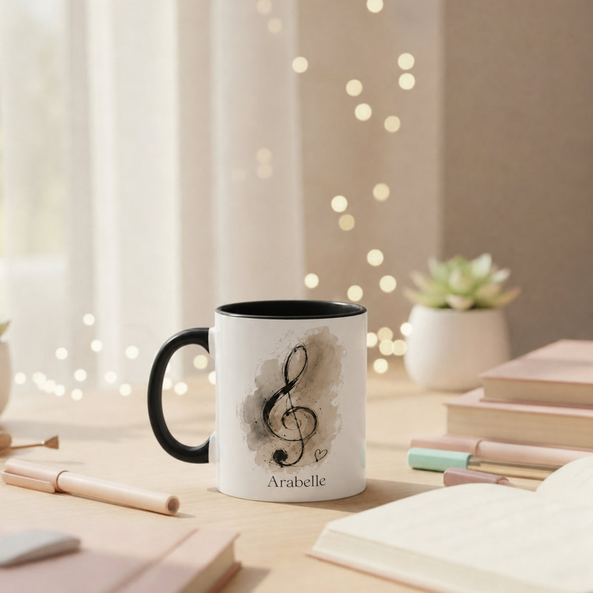 Treble Dreams Arabelle personalised music mug displayed on a bright study desk surrounded by books stationery and soft fairy lights.